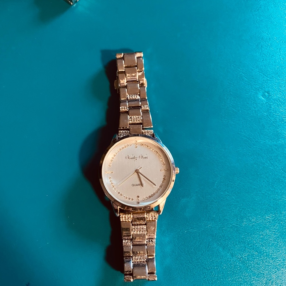 Voulez Vous stainless-Steel quartz watch with gold tone finish